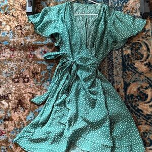 Teal green wrap dress with white polka dots